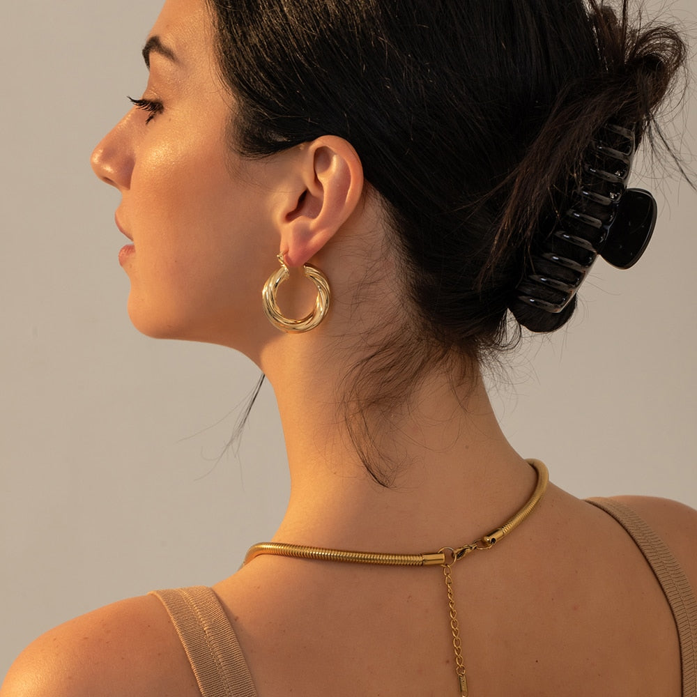 Golden Geometric Twirl Hoop Earrings